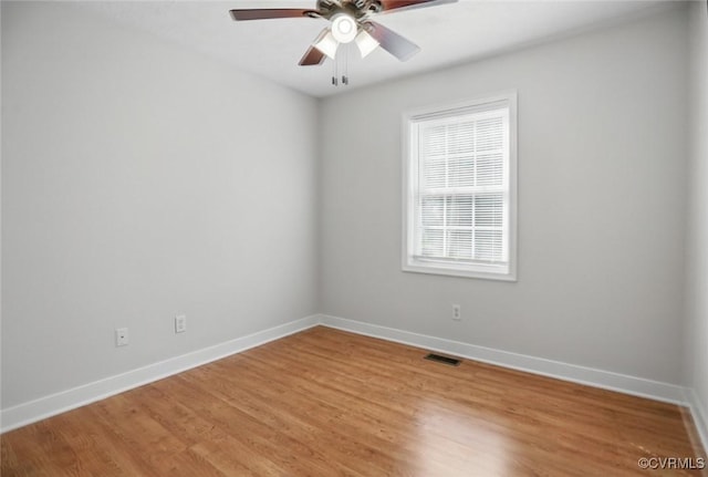 108 N Cedar Ave, Highland Springs, VA 23075 - empty room with ceiling fan and light wood finished floors