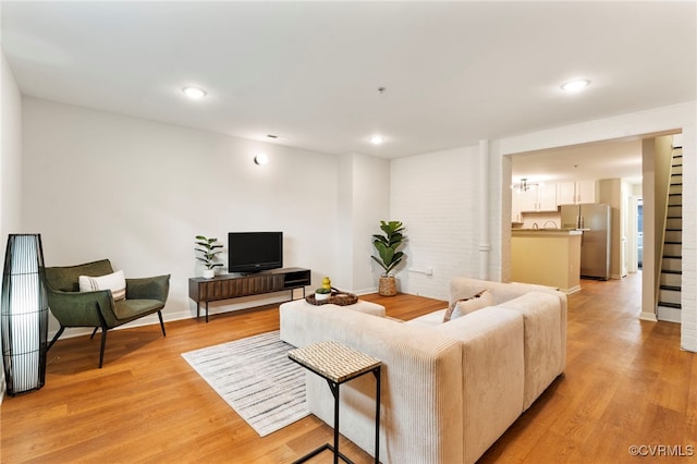 1716 Summit Ave Unit 18, Richmond, VA 23230 - living room featuring light wood-style floors and recessed lighting