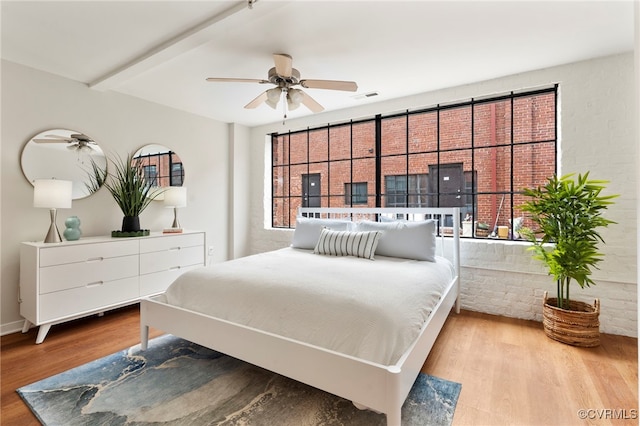 1716 Summit Ave Unit 18, Richmond, VA 23230 - bedroom featuring wood finished floors and multiple windows