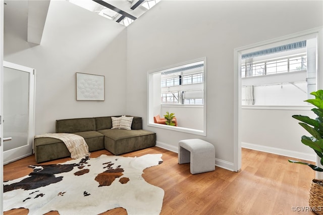1716 Summit Ave Unit 18, Richmond, VA 23230 - living room with wood finished floors and a high ceiling