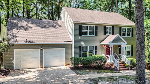 107 Oak Ridge Ct, Williamsburg, VA 23188 - colonial house featuring asphalt driveway and a shingled roof