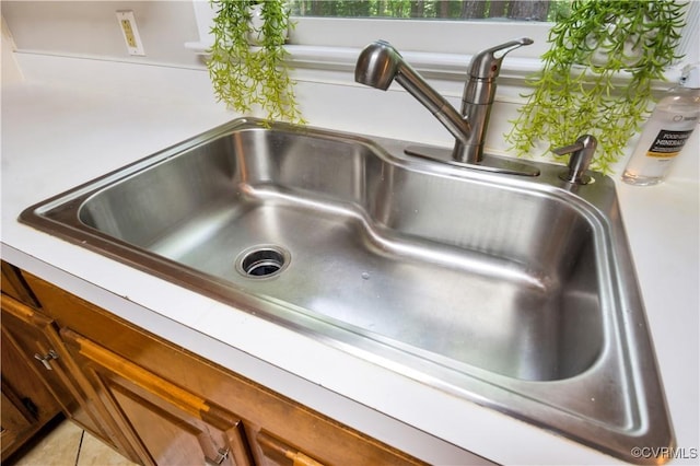 107 Oak Ridge Ct, Williamsburg, VA 23188 - kitchen view of light countertops and brown cabinetry