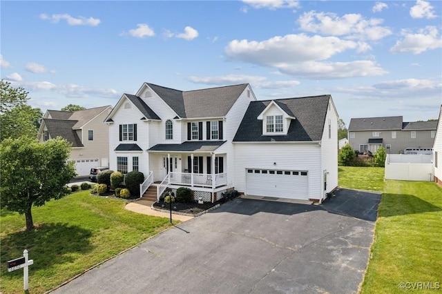 6030 Pond Place Way, Mechanicsville, VA 23111 - view of front of house with a porch, driveway, a front lawn, and roof with shingles