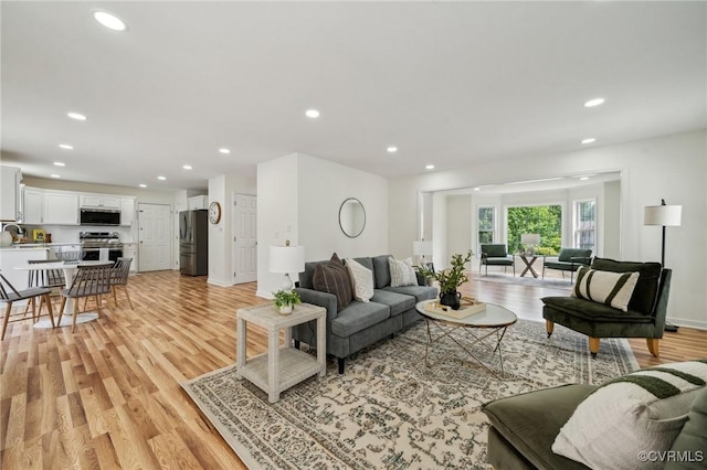6030 Pond Place Way, Mechanicsville, VA 23111 - living area with light wood finished floors and recessed lighting