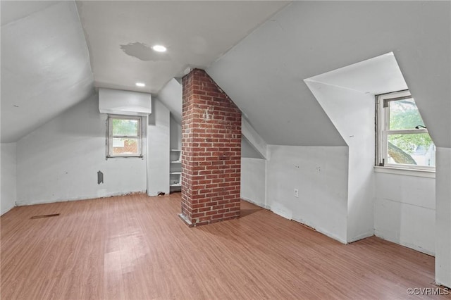 4123 Bremner Blvd, Henrico, VA 23228 - additional living space featuring wood finished floors, plenty of natural light, and lofted ceiling