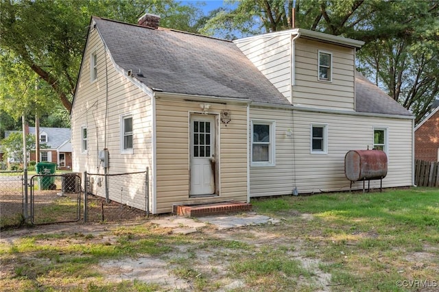 4123 Bremner Blvd, Henrico, VA 23228 - rear view of property with heating fuel, a gate, roof with shingles, and a chimney