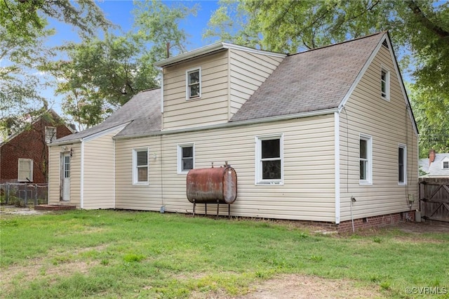 4123 Bremner Blvd, Henrico, VA 23228 - rear view of house featuring oil tank, roof with shingles, and crawl space