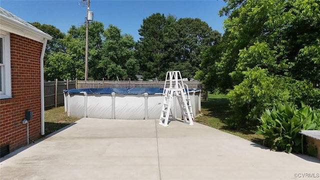 6010 Courthouse Rd, Prince George, VA 23875 - view of swimming pool featuring view of wooded area
