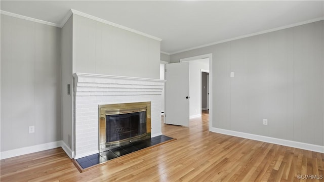 6010 Courthouse Rd, Prince George, VA 23875 - unfurnished living room with wood finished floors, a brick fireplace, and crown molding