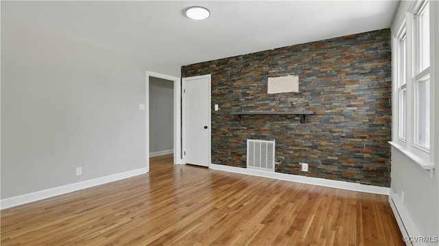 6010 Courthouse Rd, Prince George, VA 23875 - spare room featuring light wood-style floors and a baseboard radiator