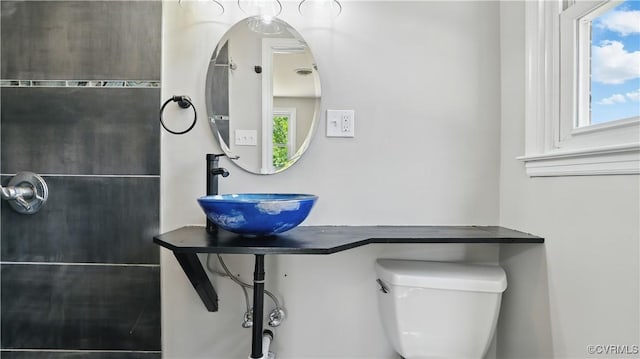6010 Courthouse Rd, Prince George, VA 23875 - half bathroom featuring a sink and toilet