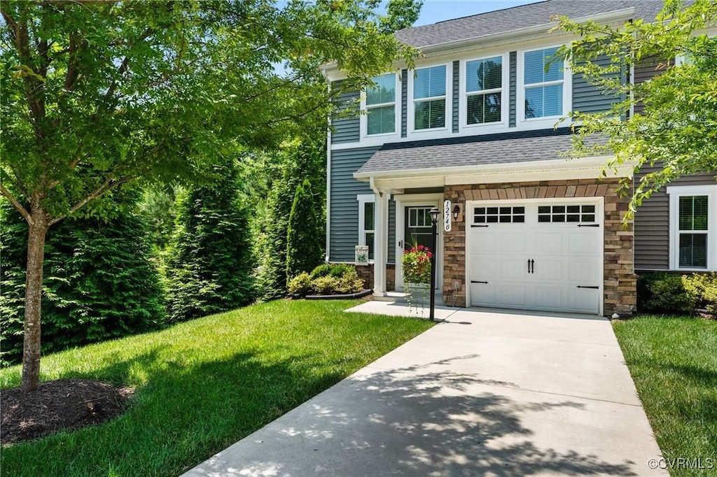 12740 Prestonfield Dr, Chester, VA 23836 - view of front of house featuring an attached garage, a front yard, concrete driveway, and roof with shingles