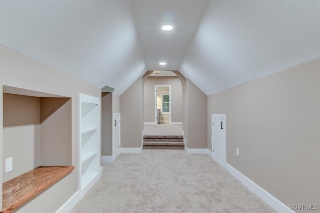 12309 Main St, Stony Creek, VA 23882 - additional living space with vaulted ceiling, light carpet, built in features, and recessed lighting