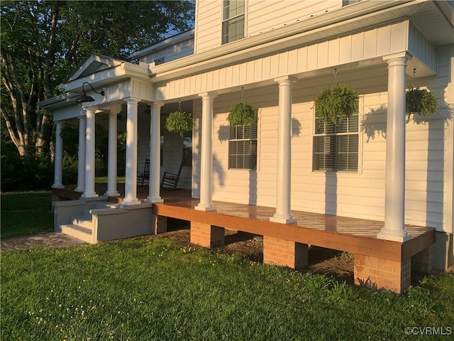 12309 Main St, Stony Creek, VA 23882 - covered porch with a lawn