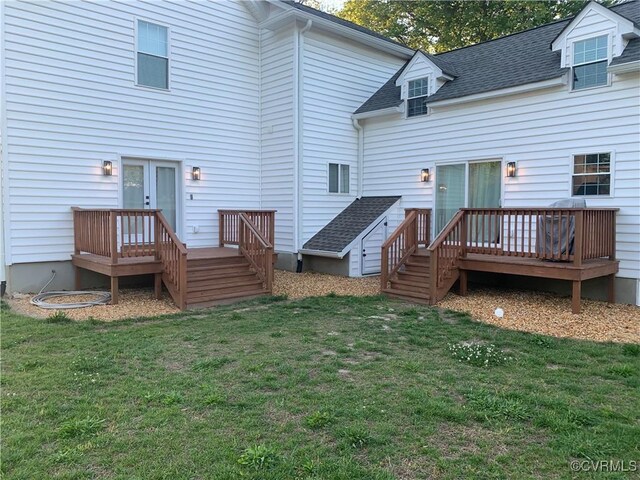 12309 Main St, Stony Creek, VA 23882 - back of property with a wooden deck, a yard, stairs, and roof with shingles