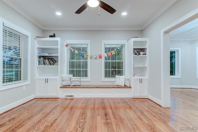 12309 Main St, Stony Creek, VA 23882 - empty room with light wood finished floors, crown molding, ceiling fan, and recessed lighting