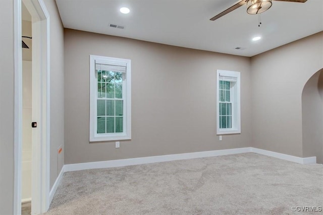 12309 Main St, Stony Creek, VA 23882 - unfurnished room with arched walkways, a ceiling fan, carpet floors, and recessed lighting
