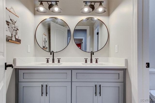 12309 Main St, Stony Creek, VA 23882 - full bathroom featuring toilet and double vanity