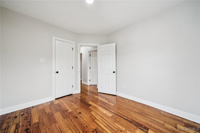 627 Colonial Ave, Colonial Heights, VA 23834 - unfurnished bedroom featuring baseboards and hardwood / wood-style flooring