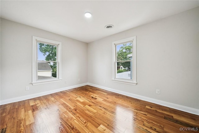 627 Colonial Ave, Colonial Heights, VA 23834 - unfurnished room featuring plenty of natural light and wood finished floors