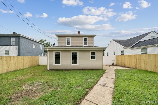 627 Colonial Ave, Colonial Heights, VA 23834 - back of house featuring a fenced backyard and a chimney