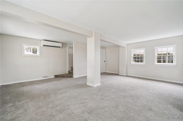 627 Colonial Ave, Colonial Heights, VA 23834 - basement featuring an AC wall unit, stairs, carpet flooring, and plenty of natural light
