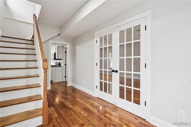 627 Colonial Ave, Colonial Heights, VA 23834 - staircase featuring french doors and hardwood / wood-style flooring