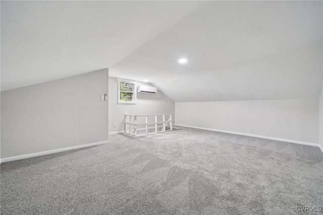 627 Colonial Ave, Colonial Heights, VA 23834 - additional living space featuring a wall unit AC, vaulted ceiling, carpet floors, and recessed lighting