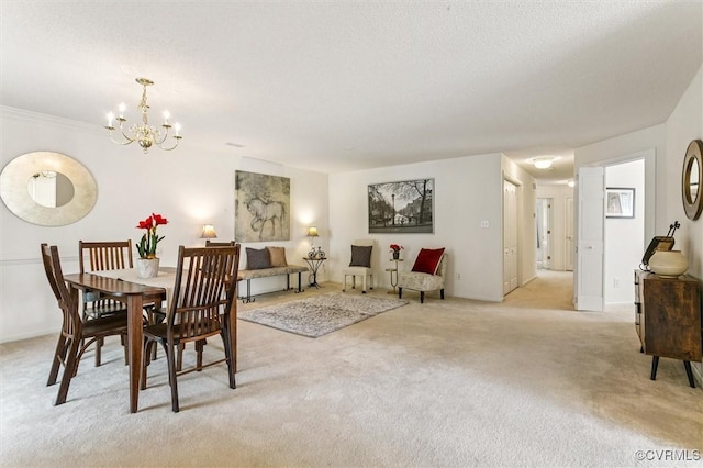 262 Claiborne Dr, Williamsburg, VA 23185 - dining space featuring light carpet and a chandelier