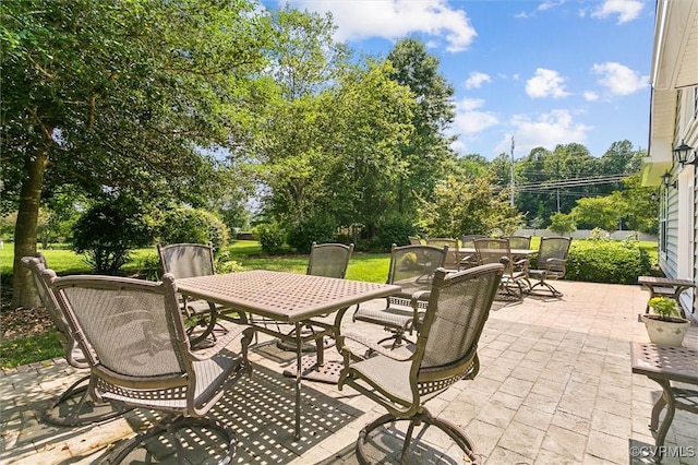 262 Claiborne Dr, Williamsburg, VA 23185 - view of patio / terrace with outdoor dining space and view of scattered trees
