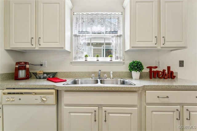 262 Claiborne Dr, Williamsburg, VA 23185 - kitchen featuring dishwasher, light countertops, and white cabinetry