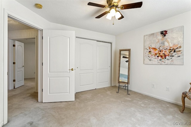 262 Claiborne Dr, Williamsburg, VA 23185 - unfurnished bedroom with light carpet, a closet, and ceiling fan