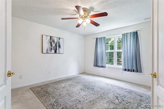 262 Claiborne Dr, Williamsburg, VA 23185 - spare room with carpet, ceiling fan, and a textured ceiling