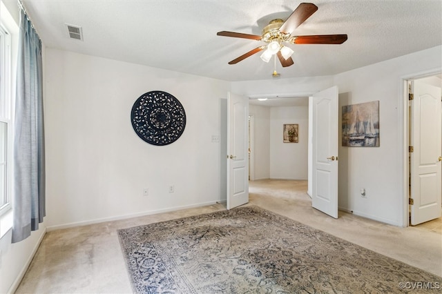 262 Claiborne Dr, Williamsburg, VA 23185 - unfurnished room with light colored carpet and ceiling fan
