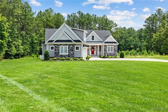 8000 Clancy Pl, Chesterfield, VA 23838 - view of front facade featuring stone siding, a front lawn, and a porch
