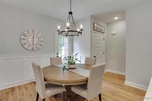 6504 Sanford Springs Cv, Midlothian, VA 23112 - dining room featuring a chandelier, light wood finished floors, a decorative wall, a wainscoted wall, and recessed lighting