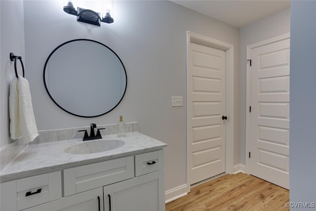 6504 Sanford Springs Cv, Midlothian, VA 23112 - bathroom with vanity and wood finished floors
