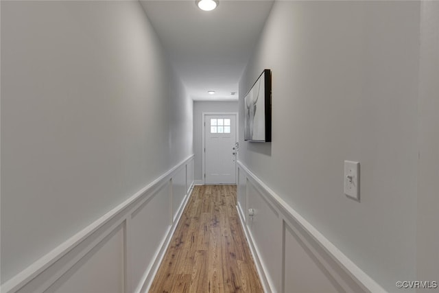6504 Sanford Springs Cv, Midlothian, VA 23112 - corridor featuring light wood finished floors, a decorative wall, wainscoting, and recessed lighting