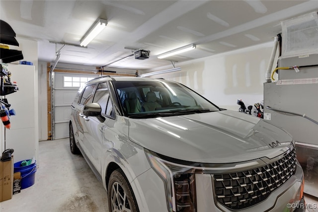 6504 Sanford Springs Cv, Midlothian, VA 23112 - garage featuring a garage door opener