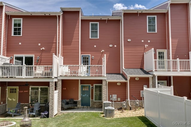 6504 Sanford Springs Cv, Midlothian, VA 23112 - rear view of house featuring a balcony and a patio