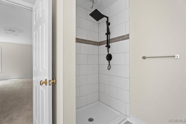 13713 Nile Rd, Chester, VA 23831 - bathroom featuring tiled shower and baseboards