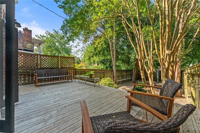 2417 E Grace St, Richmond, VA 23223 - wooden terrace featuring a fenced backyard