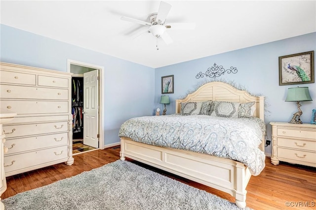 10151 W Providence Rd, North Chesterfield, VA 23236 - bedroom with wood finished floors, a spacious closet, and ceiling fan