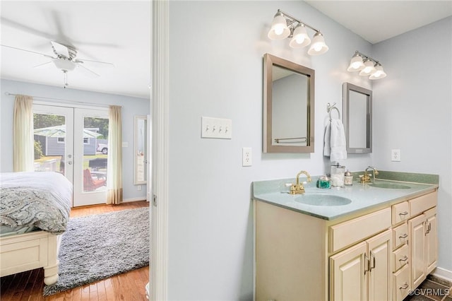 10151 W Providence Rd, North Chesterfield, VA 23236 - full bath with wood finished floors, double vanity, french doors, and ceiling fan