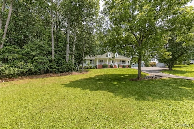 10151 W Providence Rd, North Chesterfield, VA 23236 - view of front of home with a front lawn, covered porch, and driveway