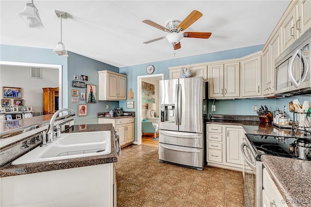 10151 W Providence Rd, North Chesterfield, VA 23236 - kitchen with appliances with stainless steel finishes, ceiling fan, hanging light fixtures, and dark countertops
