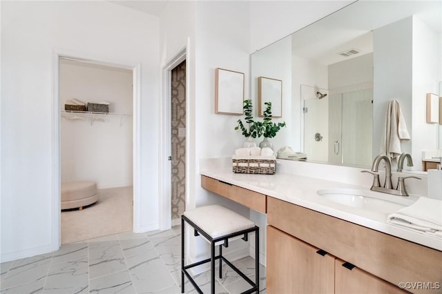 3446 Carlton St Unit 6-8A, Richmond, VA 23230 - full bathroom featuring a walk in closet, vanity, marble look tiles, and a shower stall