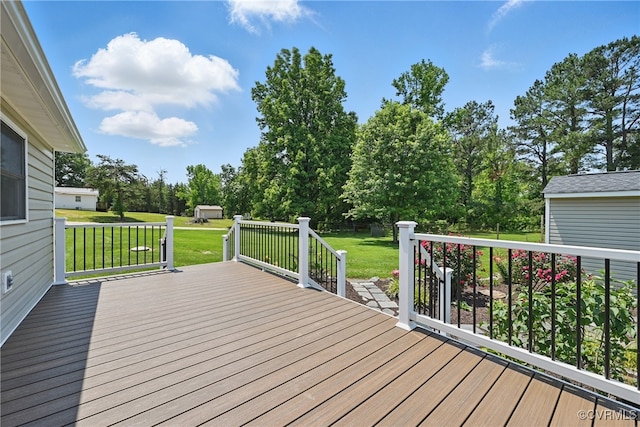 99 Oak Hill Rd, Cumberland, VA 23040 - wooden terrace featuring a lawn, view of scattered trees, and an outbuilding