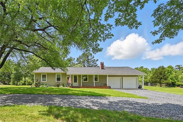 99 Oak Hill Rd, Cumberland, VA 23040 - ranch-style home with an attached garage, a chimney, a front lawn, and gravel driveway