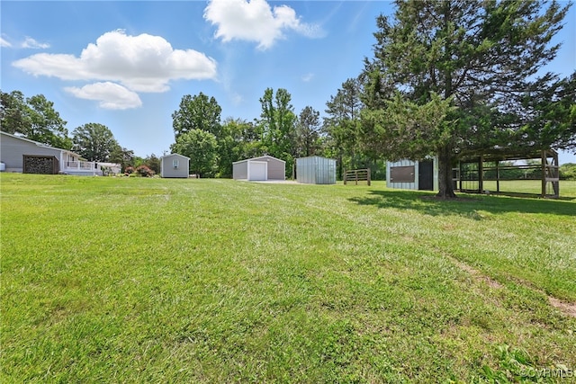 99 Oak Hill Rd, Cumberland, VA 23040 - view of green lawn featuring a garage and an outdoor structure